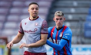 Caley Thistle's Wallace Duffy, right, keeps tabs on Arbroath's Leighton McIntosh.