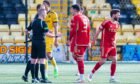 Aberdeen players look dejected as the referee rules Bojan Miovski's goal at Livingston offside. Image: SNS.