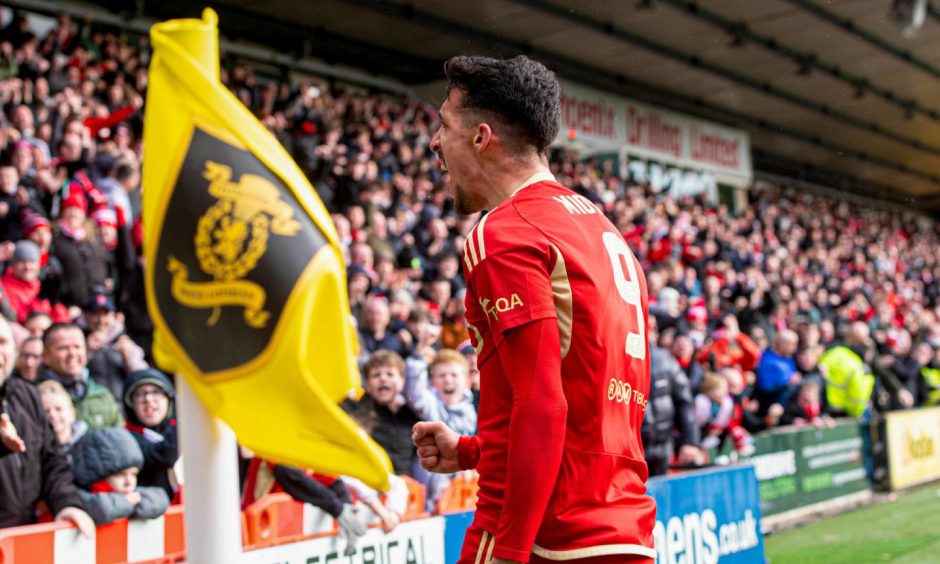 Aberdeen's Bojan Miovski celebrates what he thought was a late winner, only for it to be chalked off following a VAR review. Image: SNS