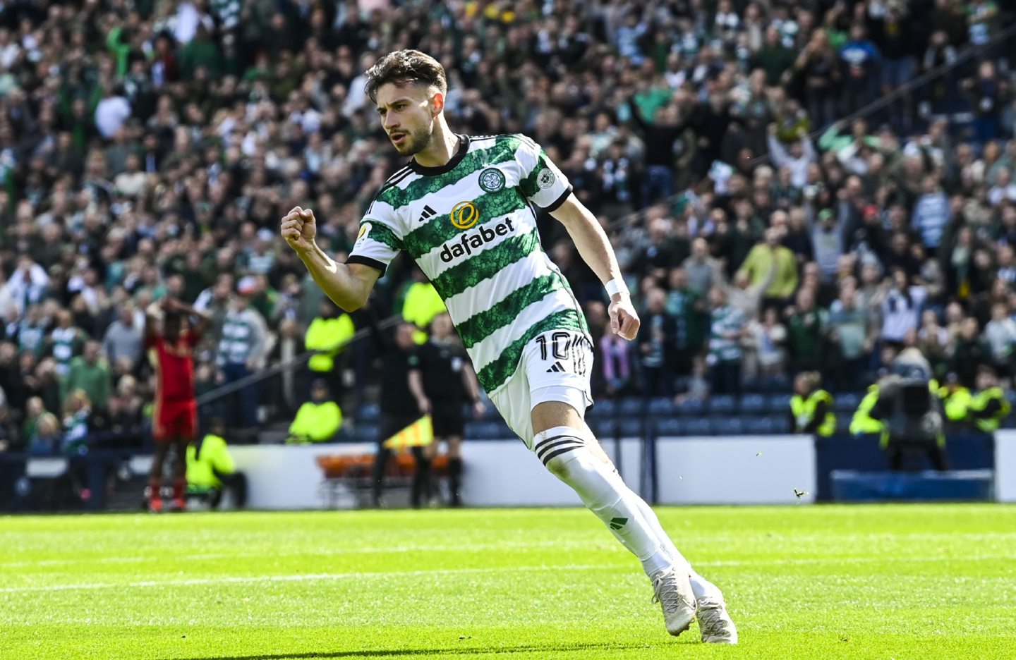 Celtic's Nicolas Kuhn celebrates as he scores to make it 1-1 during the Scottish Gas Scottish Cup semi-final. Image: SNS 