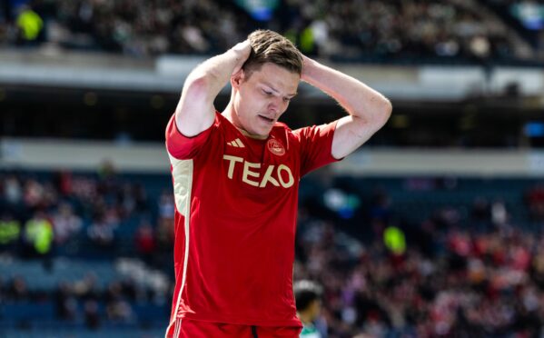 Aberdeen's Stefan Gartenmann with his hands on his head during Saturday's game against Celtic at Hampden Park