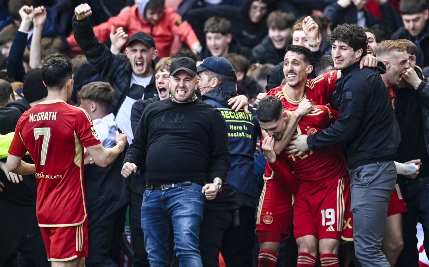  Aberdeen's Ester Sokler celebrates with Bojan Miovski and fans as he scores to make it 2-2 during a Scottish Cup semi-final against Celtic at Hampden. Image: SNS 