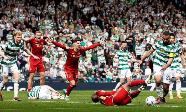 Aberdeen appeal for a penalty after Celtic's Cameron Carter-Vickers takes down Junior Hoilett. Image: SNS.