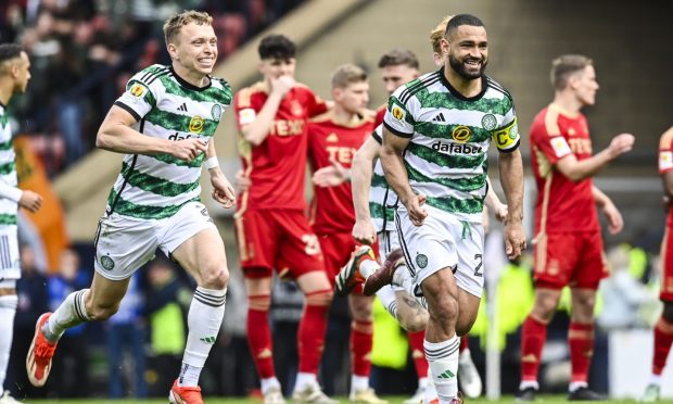 Celtic's Alistair Johnston (L) and Cameron Carter-Vickers celebrate at full time after beating Aberdeen 6-5 on penalties. Image: SNS