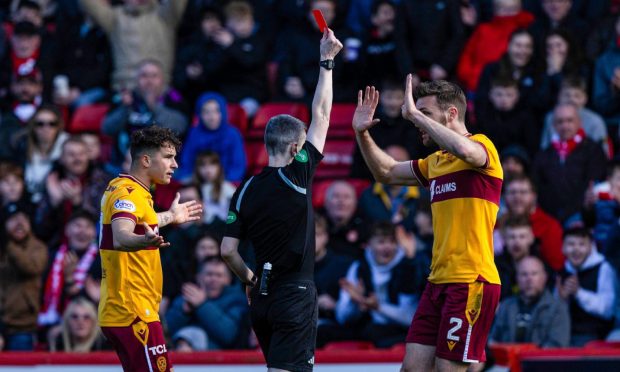 Referee Craig Napier shows Motherwell's Jack Vale a red card (not in frame) against Aberdeen. Image; SNS