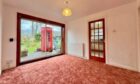 Inverness home with iconic red telephone box for sale