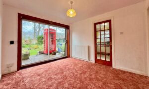 This Inverness house has a unique selling point - an old-fashioned phone box in the back garden. Image:  eXp UK/Rightmove