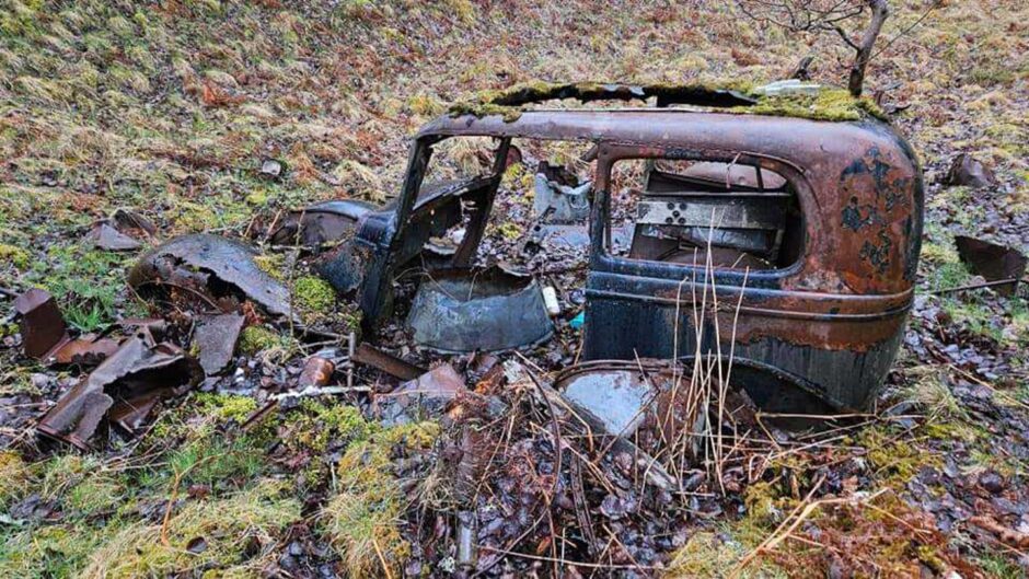 Ford model Y from the 1930s abandoned in some woods in the Highlands. 