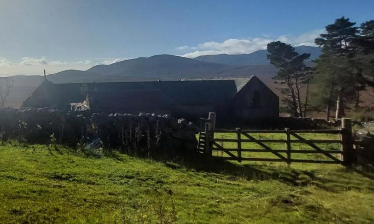 The steading which will be taken down, with that view across to Lochnagar.
