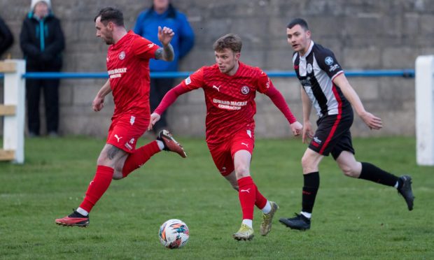 Fraserburgh's Ryan Cowie, right, looks to get away from Formartine's Andrew Greig