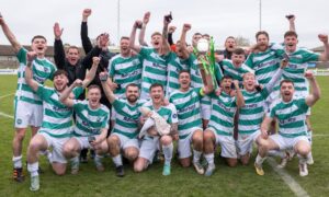 The Buckie Thistle squad with the Breedon Highland League trophy following their season 2023/24 title triumph. Image: Jasperimage.