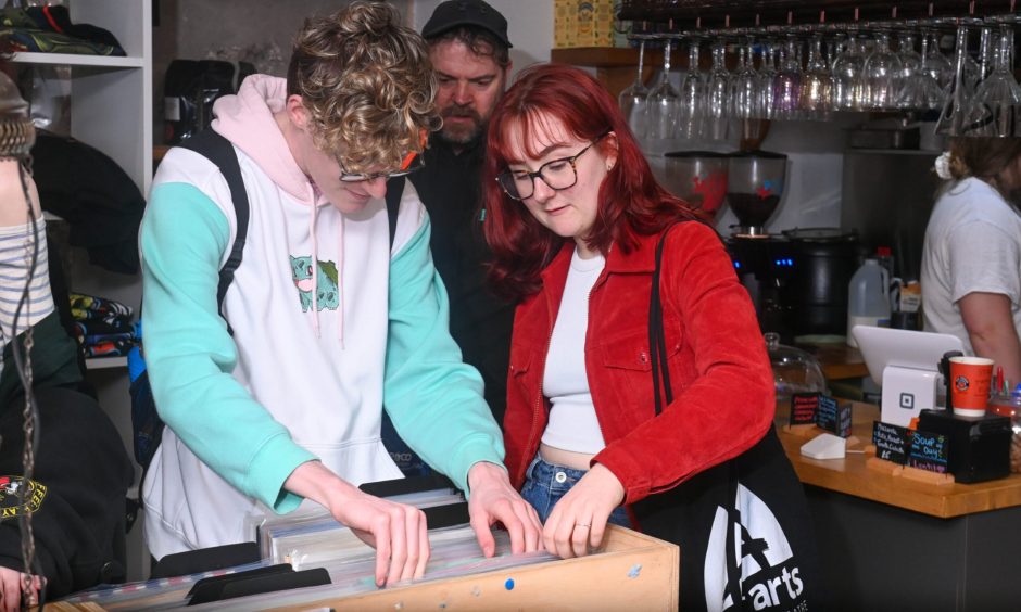 Customers shopping at Red Robin Records on its final day of trade.