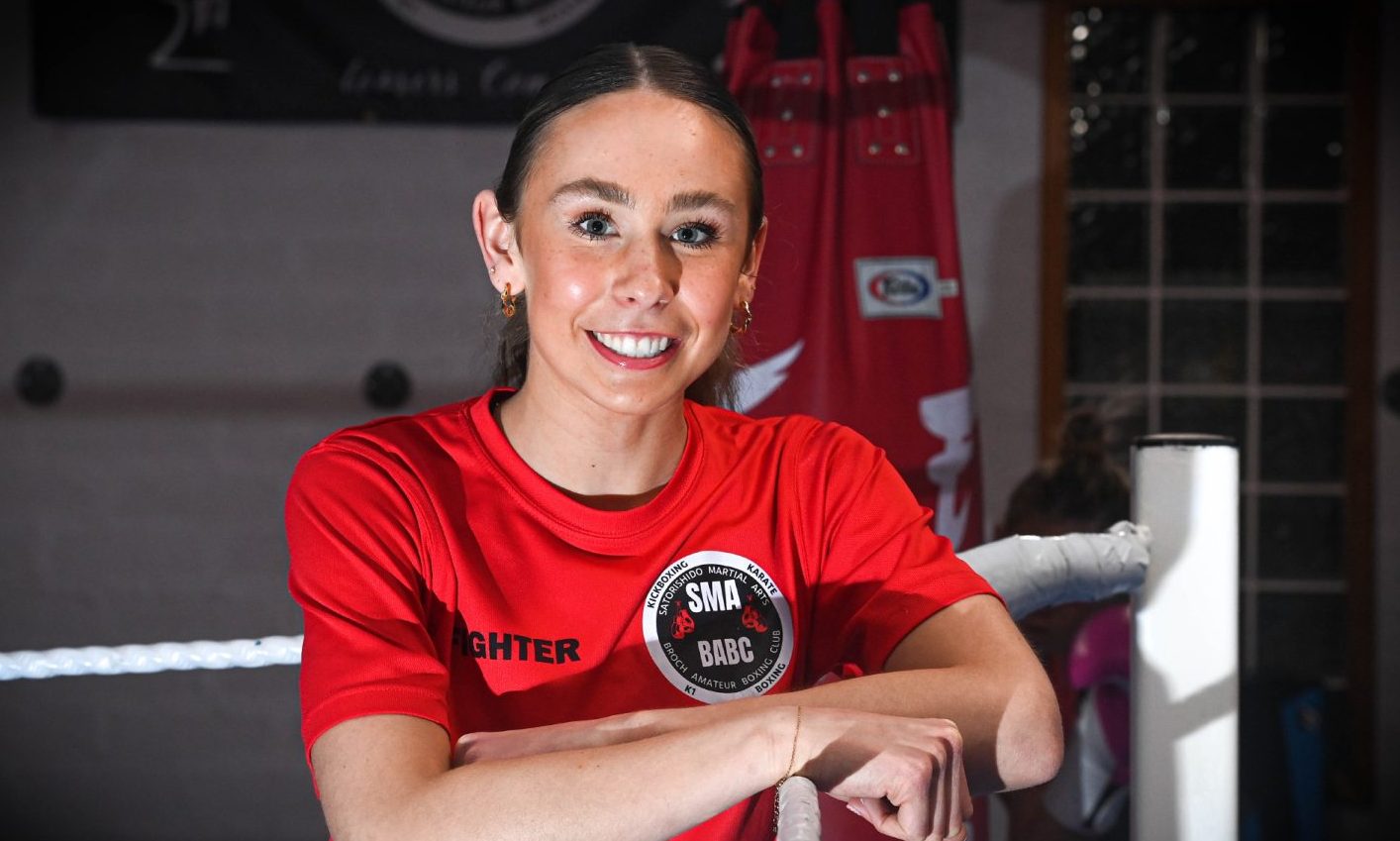 Strichen kickboxing teen Eilidh Craib poses for a picture in the ring.