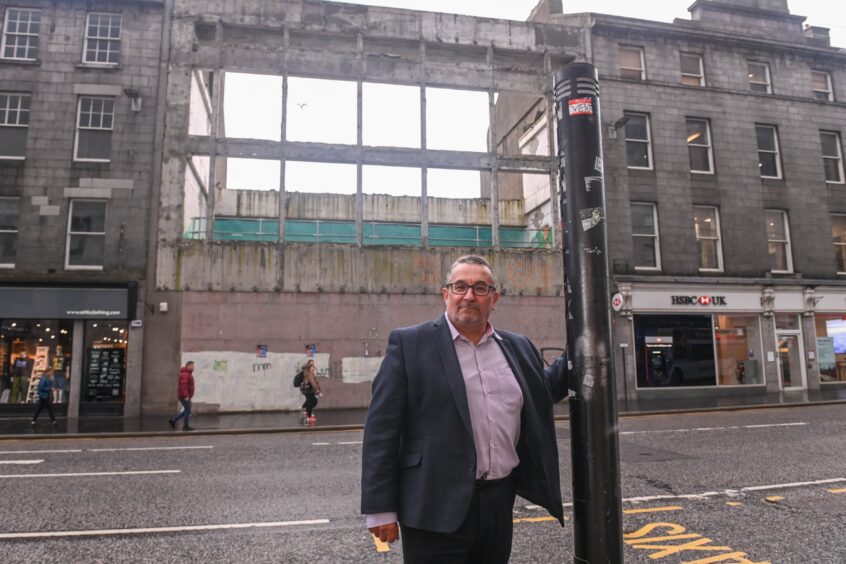 Council co-leader Christian Allard next to the night-time Union Street central tax rank, which will close during construction works. Image: Darrell Benns/DC Thomson