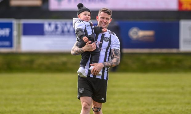 Evening Express / Press and Journal
CR0047836
Story by Callum Law
Bellslea Park, Fraserburgh
Highland League - Fraserburgh FC v Strathspey Thistle
Last game of the season title showdown.
Pictured is Fraserburgh's Ryan Cowie after his last match with his son Hudson.
Saturday 20th April 2024
Image: Darrell Benns/DC Thomson