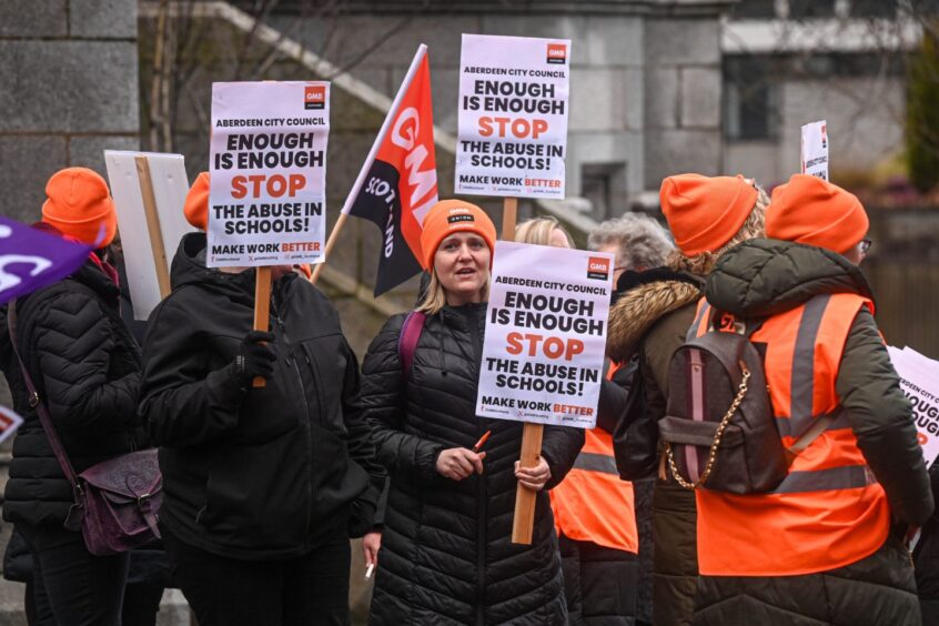 Aberdeen school support staff protested outside Marischal College in March, calling for action to end abuse and violence they face "every day". Image: Darrell Benns/DC Thomson