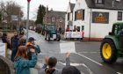 Tractors hit the roads in protest over ‘monster pylons’ in Deeside