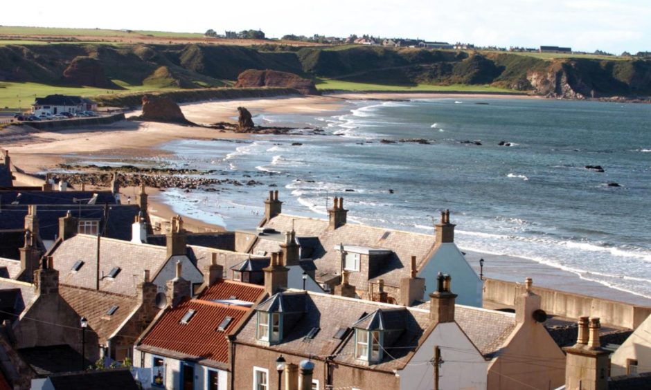 Looking across homes in Cullen towards beach.