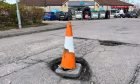 Stonehaven shops prepared to club together to sort ‘crater’
potholes deterring customers