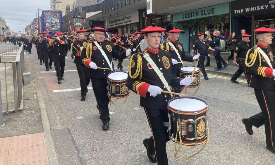 The marching band playing in Inverness