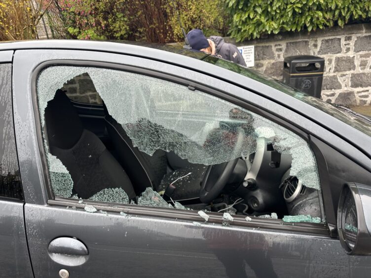 Car with smashed window.