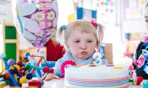 Isabella Winfield blows out her candles as she celebrates her third birthday at Ladybird Development Group Nursery in Lossiemouth.