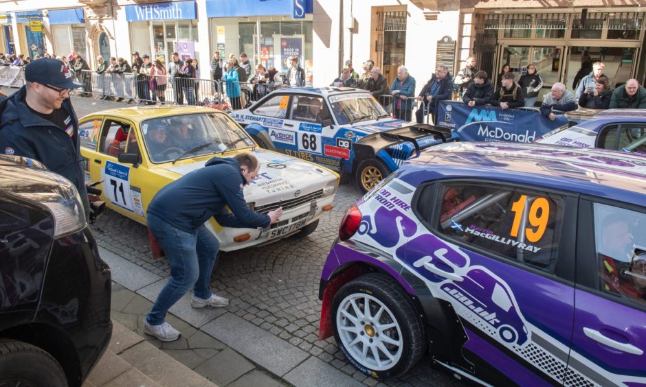 Rally cars on Elgin High Street. 