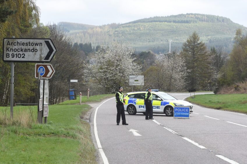 Police on the scene of the lorry and car crash near Craigellachie