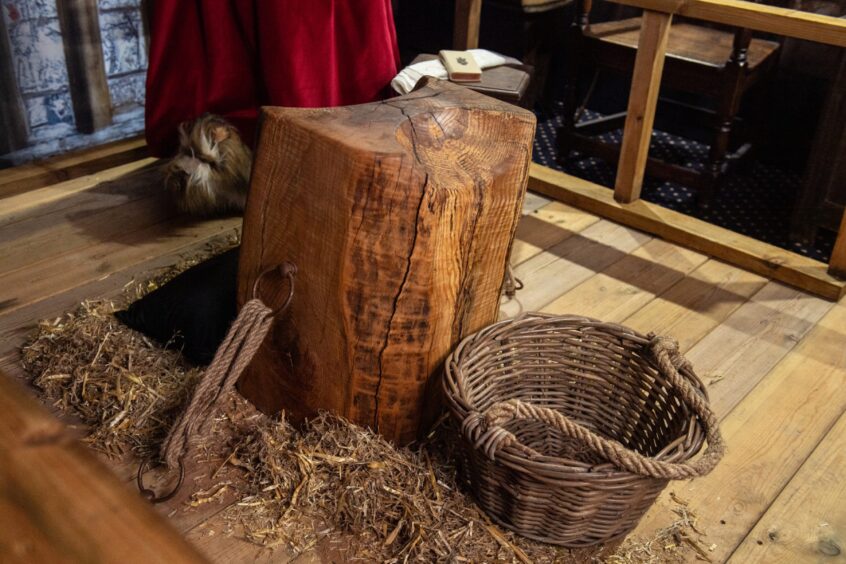 An executioner's beheading block, in the recreation of the final moments of the life of Mary Queen of Scots. 