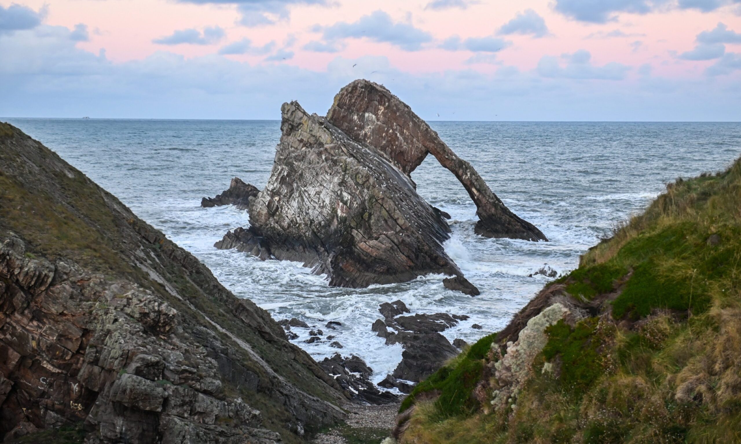 Bow Fiddle Rock viewed from between rocks. 