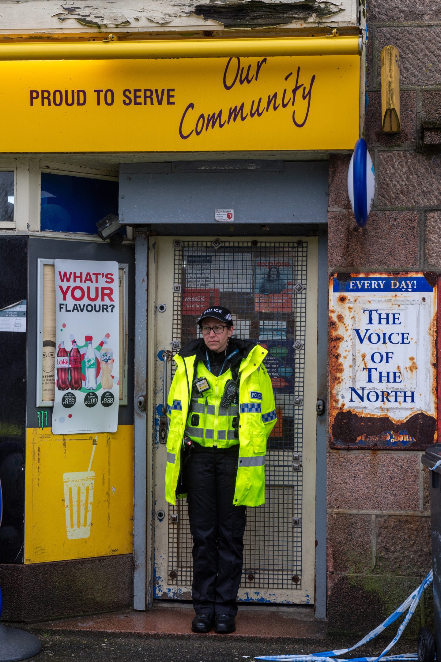 Officer outside the Peterhead shop.