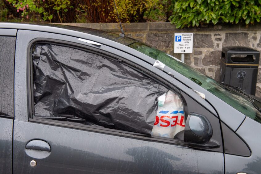 Car with smashed window on Midstocket Road in the Rosemount area of Aberdeen.