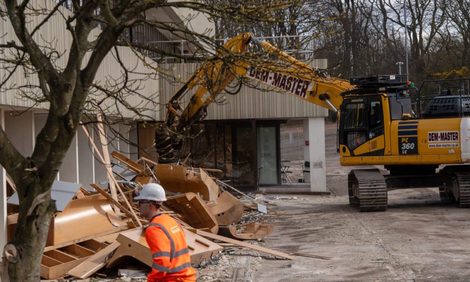 Workers stripping off the building from all furniture and office equipment in March-April. 