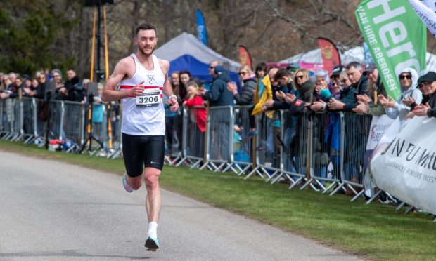 Sean Chalmers on his way to victory in the 10K race at Run Balmoral Image: Kenny Elrick/DC Thomson