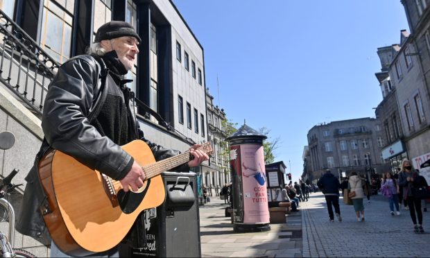 Aberdeen busker Tom at St Nicholas Square.
