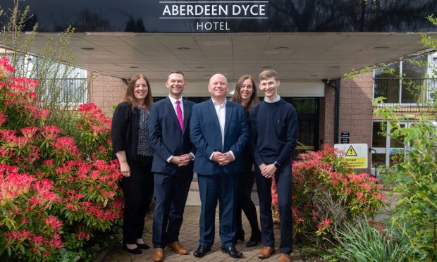 Pictured from left are Julia Leitch, Gavin Ord, Kris Manship, Helen McLoughlin and Liam Ord outside the former Marriott Hotel, which has now been rebranded as The Aberdeen Dyce Hotel.