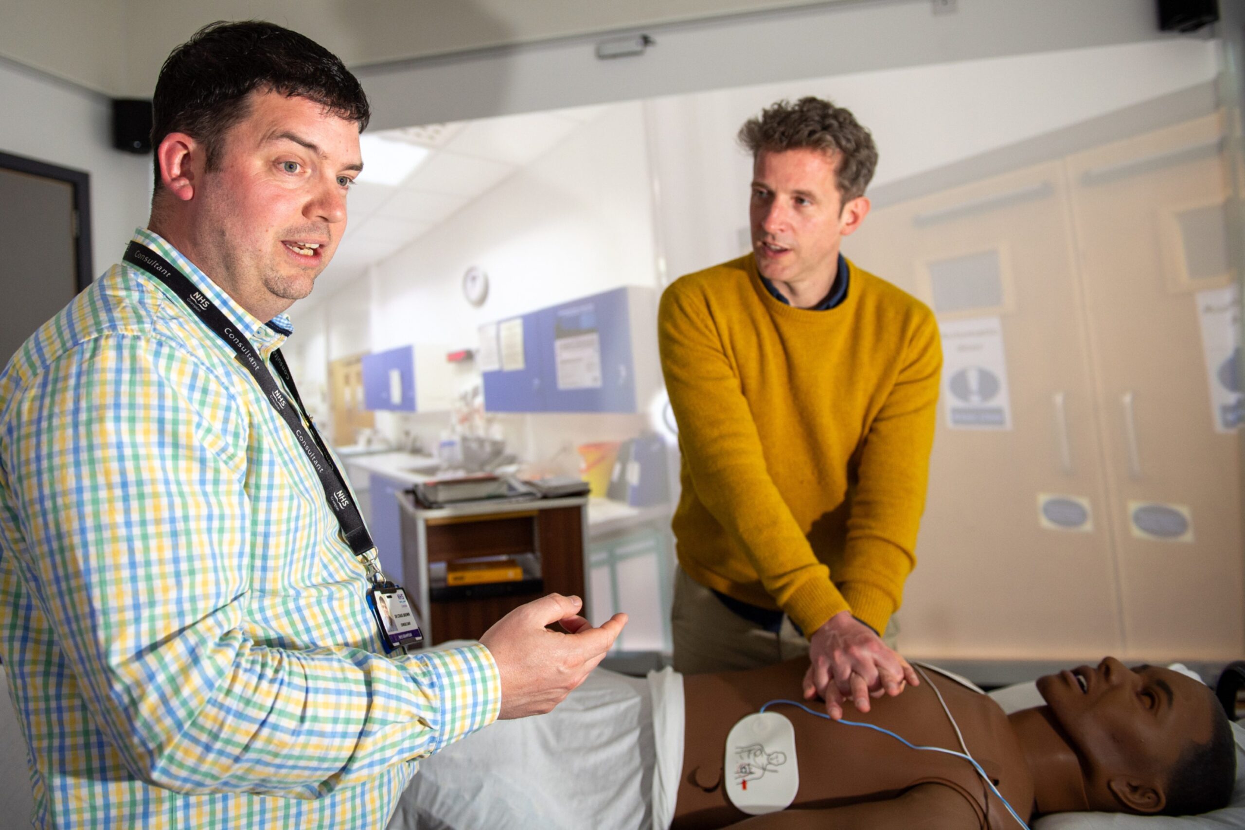 Andy performing chest compressions in Aberdeen university's immersion room