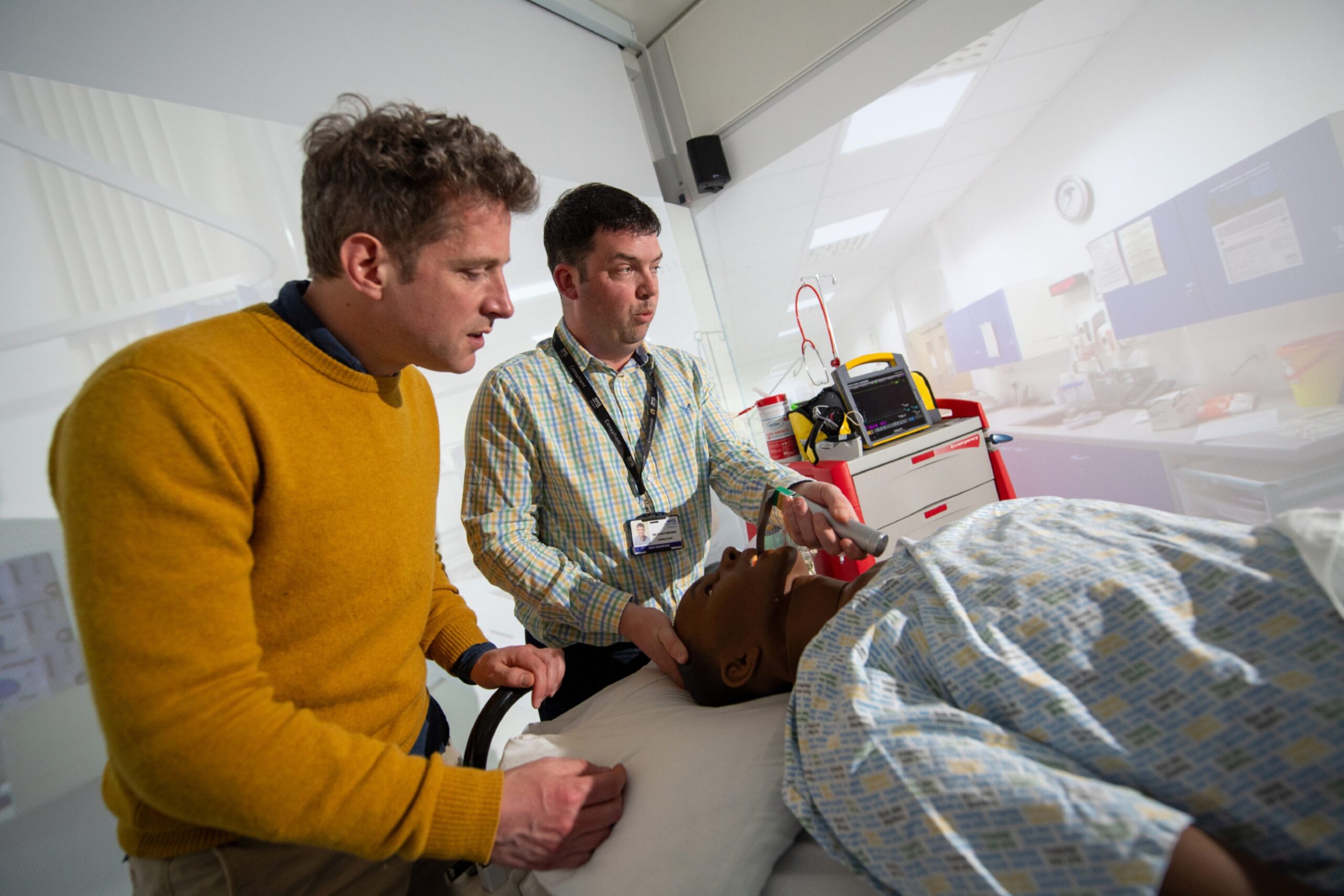 Andy and senior lecturer Craig Brown with a dummy