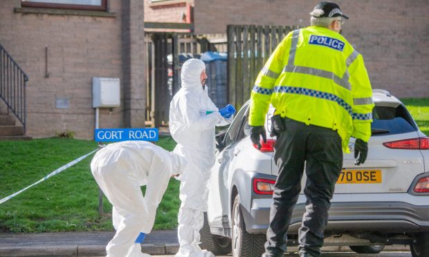 Officers at the scene of the incident in Tillydrone. Image: Kami Thomson/DC Thomson