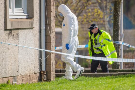 Police forensics at an incident at flats on the corner of Auchinleck Road / Gort Road, Tillydrone, which are taped off.  Image: Kami Thomson/DC Thomson.