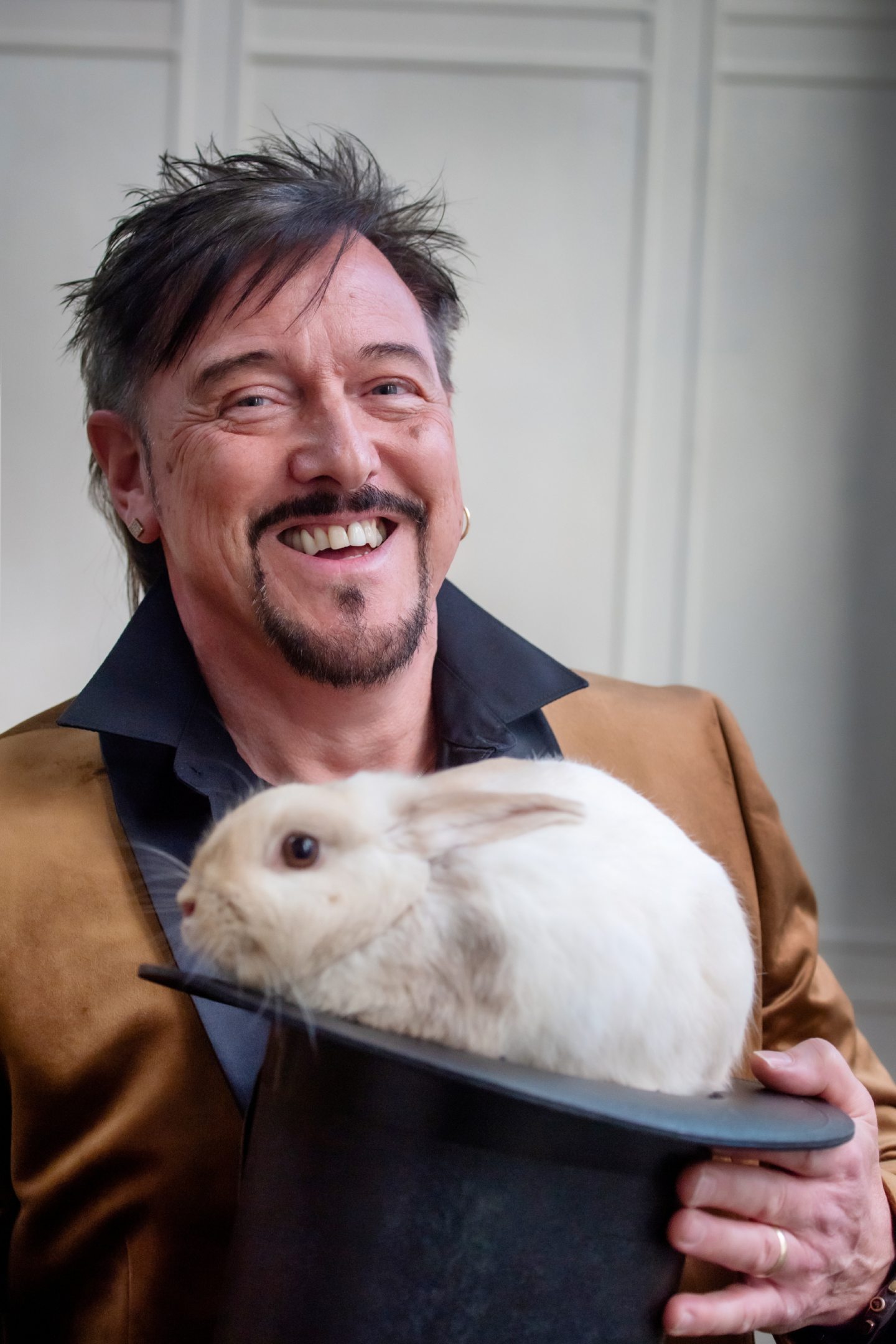 Garry Seagraves with Basil the magical nibbling rabbit from the Aberdeen Magical Society.