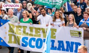 First Minister of Scotland Humza Yousaf (centre) and co-leader of the Scottish Green Party Lorna Slater (centre left) take part in a Believe in Scotland march in Edinburgh during September 2023. Image: Jane Barlow/PA Wire