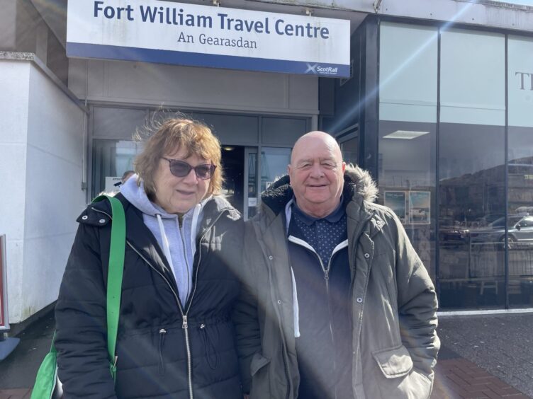 Andrew and Valerie Endacott outside Fort William travel centre.