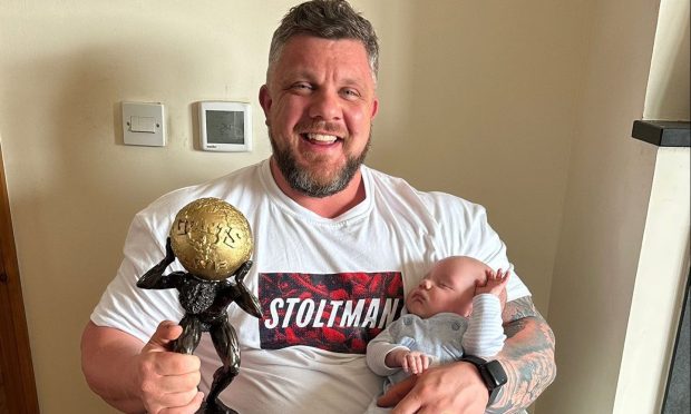 Luke Stoltman said his newborn son Koa gave him the energy he needed to win Europe's Strongest Man. Image supplied by Luke Stoltman