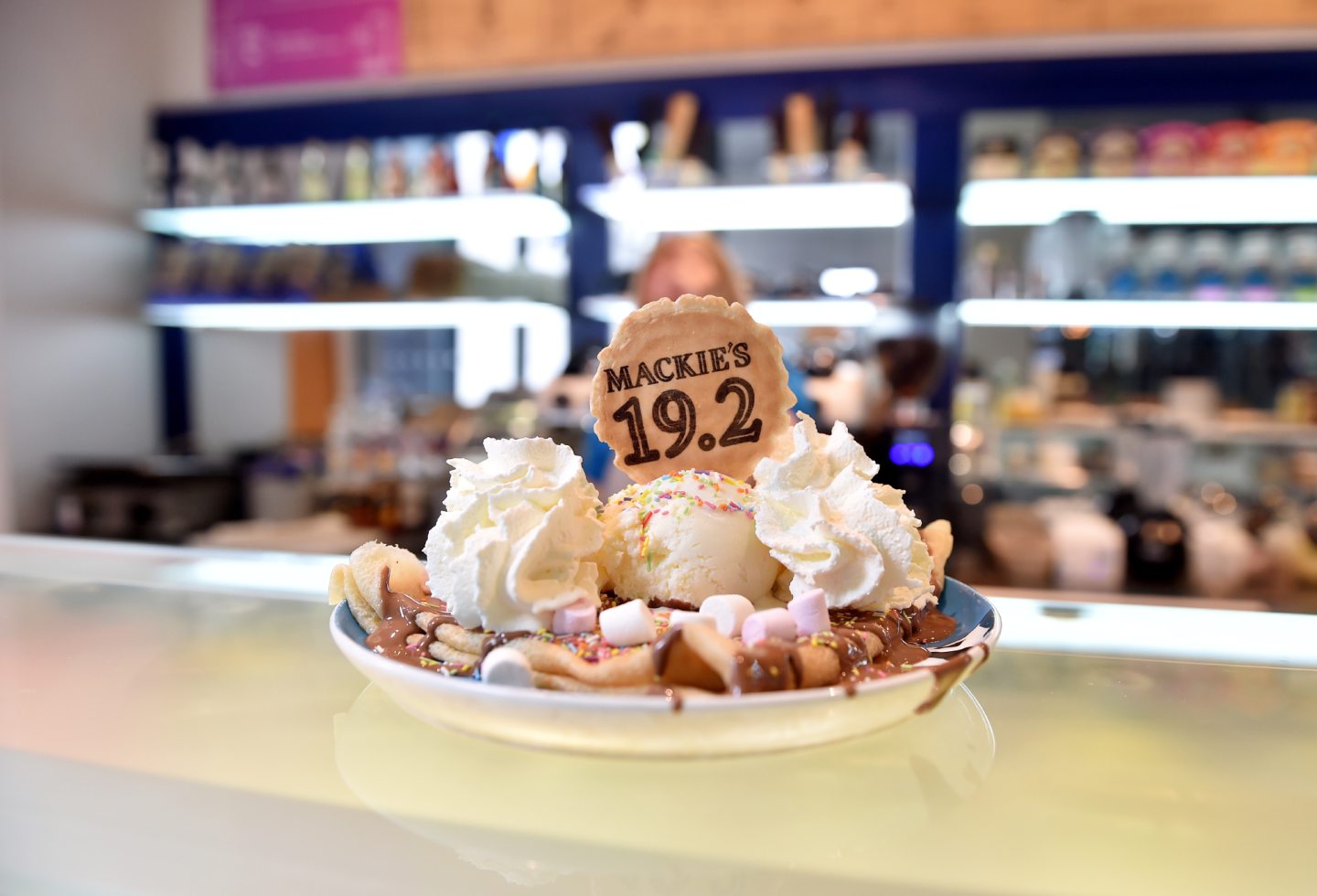 A Mackie's 19.2 crepe topped with ice cream, whipped cream, chocolate sauce, marshmallows and sprinkles.