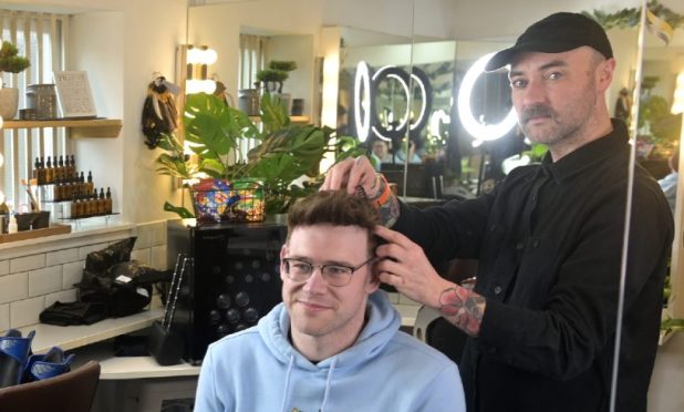 Andrew feels great after getting his new hair fitted. Image: Sandy McCook/DC Thomson