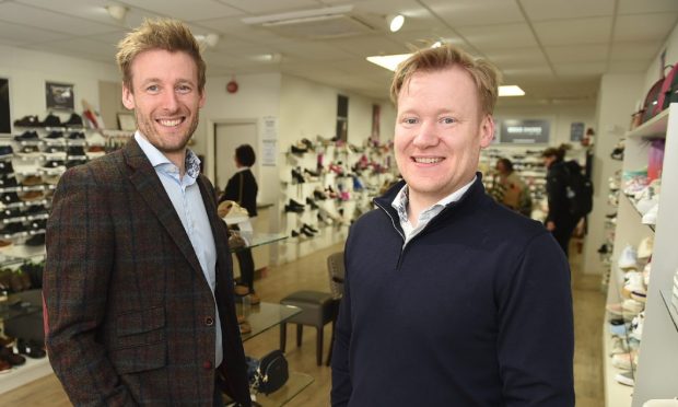Donald and Gaven Begg are the ninth generation of the family to run the shoe shops. Image: Sandy McCook/DC Thomson