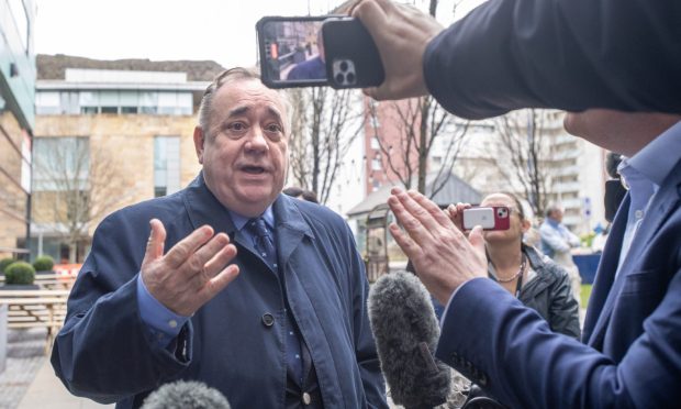 Alba Party Leader Alex Salmond speaks to the media outside the headquarters of the Scottish National Party (SNP) in Edinburgh following the arrest of former chief executive Peter Murrell. Police Scotland are conducting searches at a number of properties in connection with the ongoing investigation into the funding and finances of the party. Picture date: Wednesday April 5, 2023. PA Photo. See PA story POLICE SNP. Photo credit should read: Lesley Martin/PA Wire