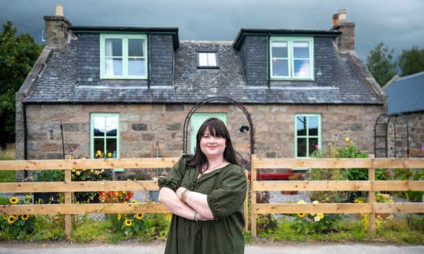 Rachel Dougherty, pictured outside her charming cottage, says she's over the moon to reach the final of Scotland's Home of the Year.