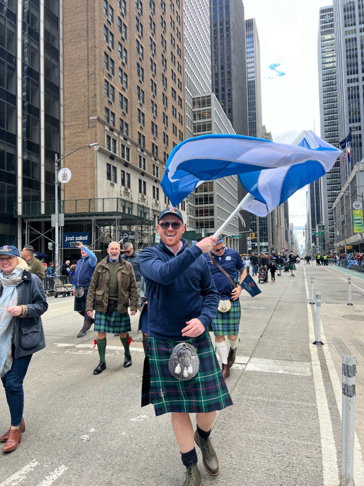 Man waving Scotland flag in New York